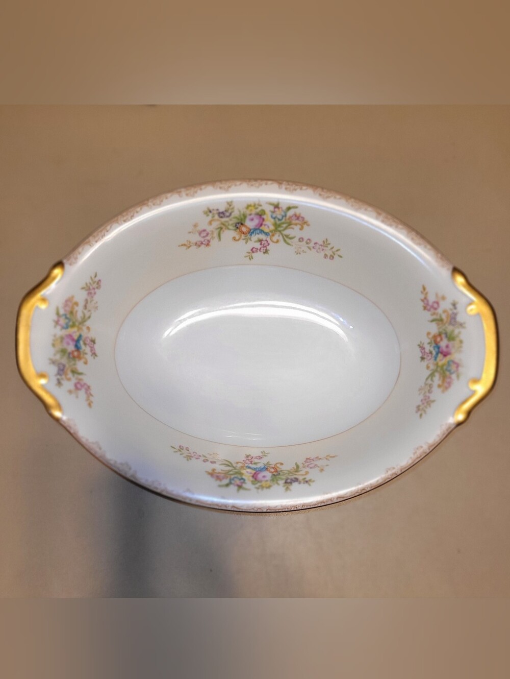 Meito China Hand Painted Porcelain Floral Serving Bowl with Gold Trim.